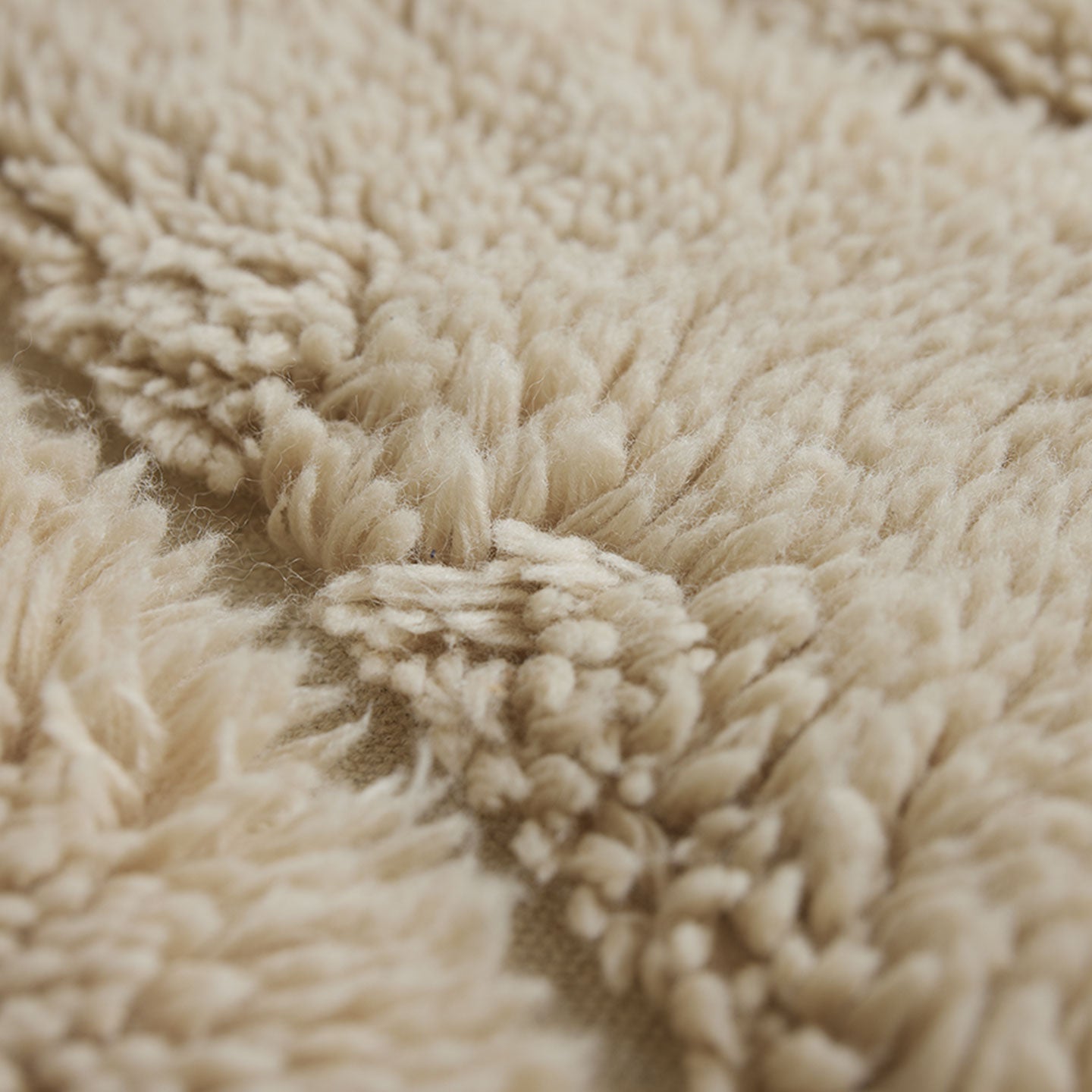 Teppich 200x140cm aus Wolle in creme - Teppich